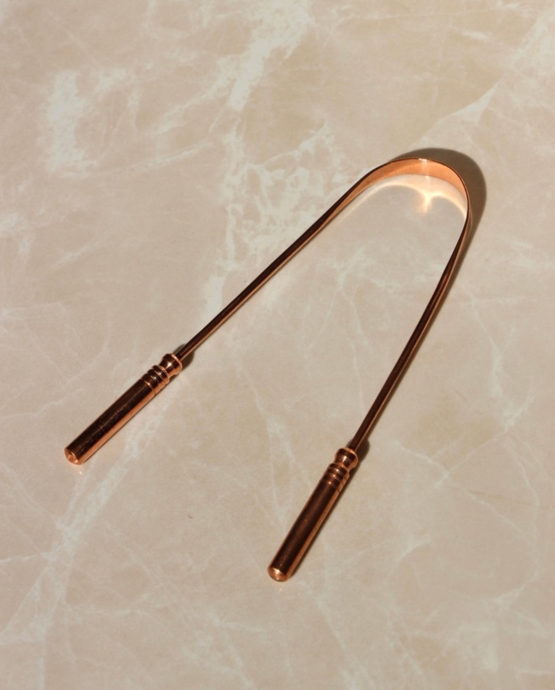 Copper tongue scraper